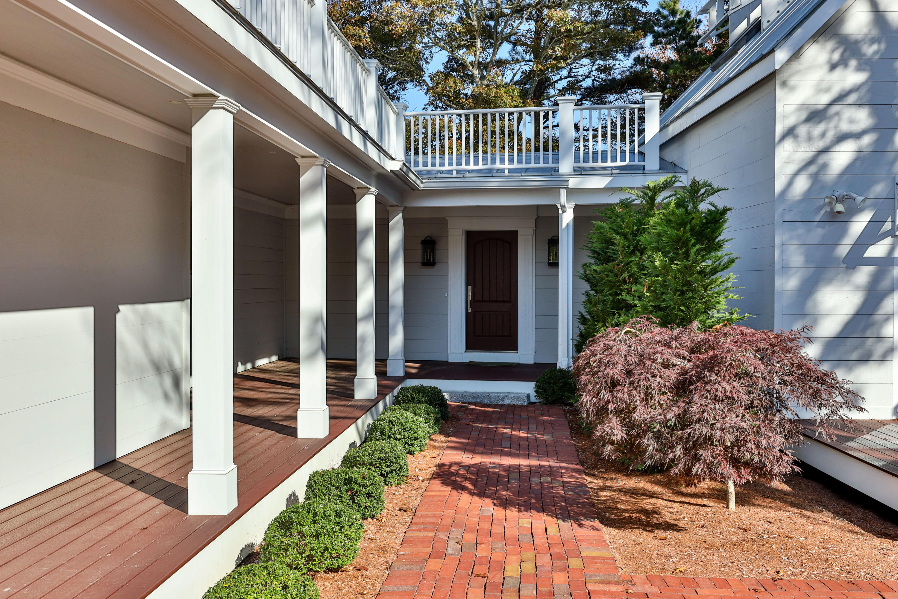 205 Uncle Percy's Road Mashpee, MA 02649 - Photo 7 of 54 a front view of a house with garden