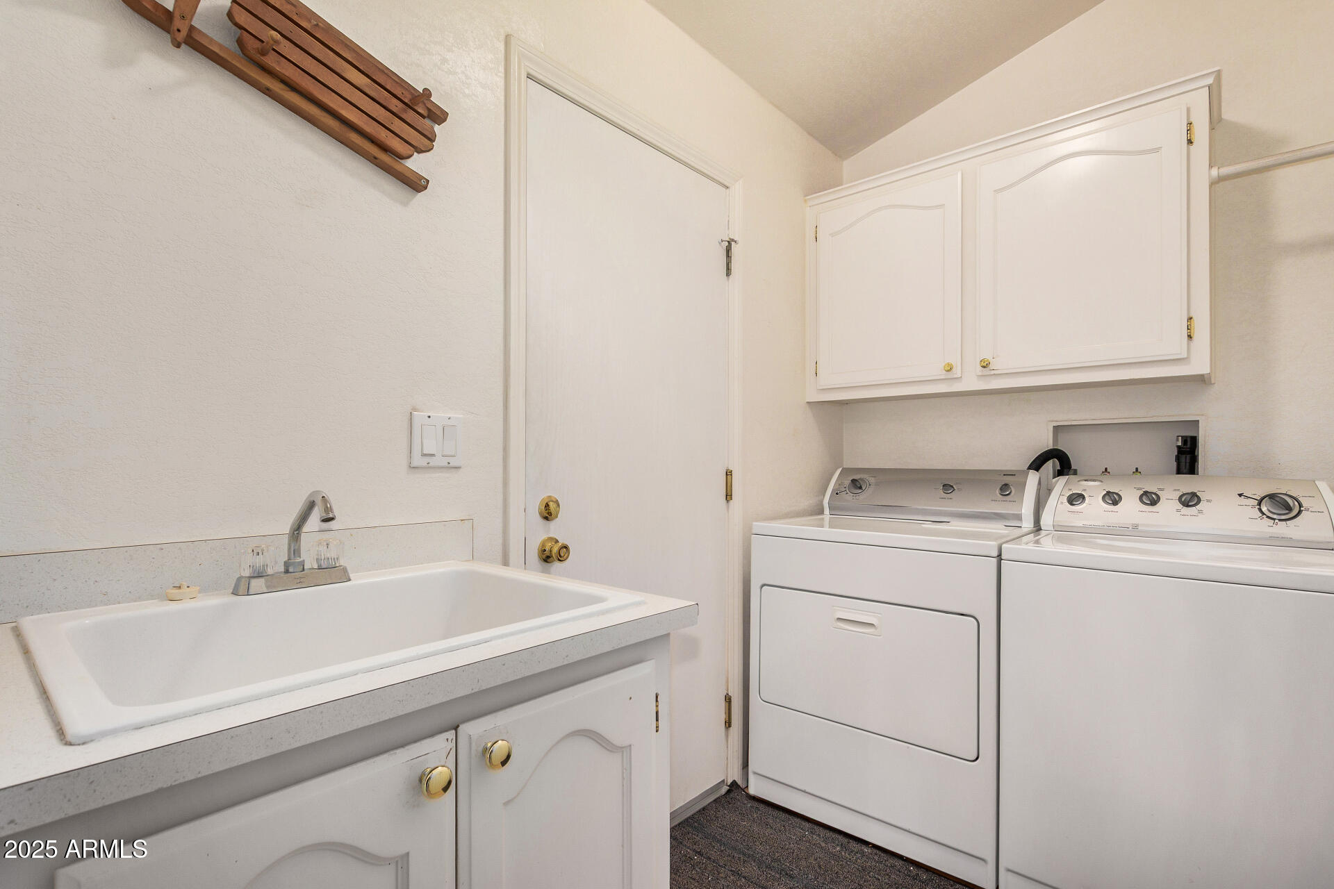 2101 South Meridian Road, Unit 27 Apache Junction, AZ 85120 - Photo 26 of 29 a bathroom with a sink and a mirror