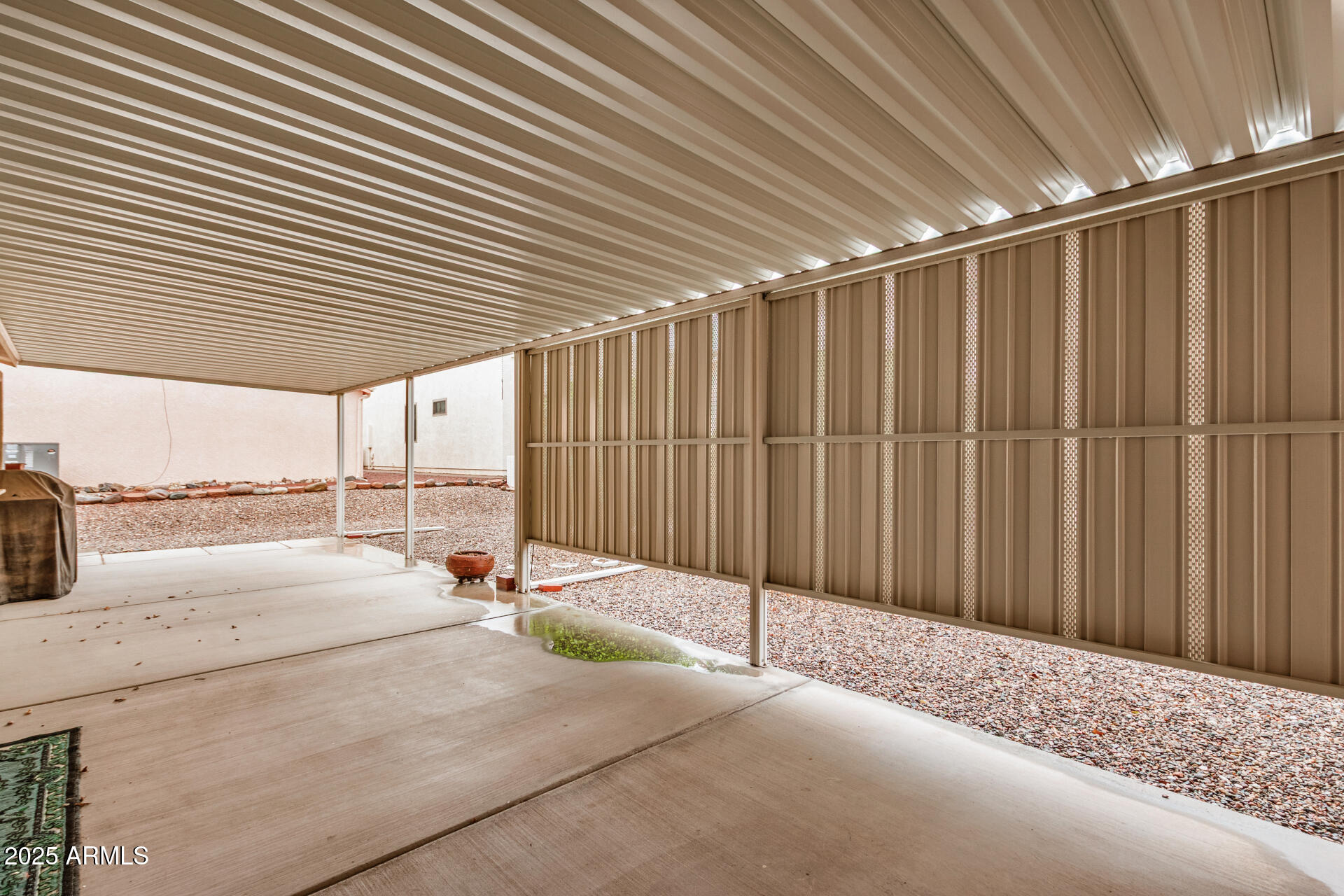 2101 South Meridian Road, Unit 27 Apache Junction, AZ 85120 - Photo 29 of 29 a view of a backyard of a house