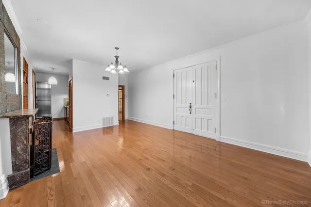 a view of a livingroom with wooden floor