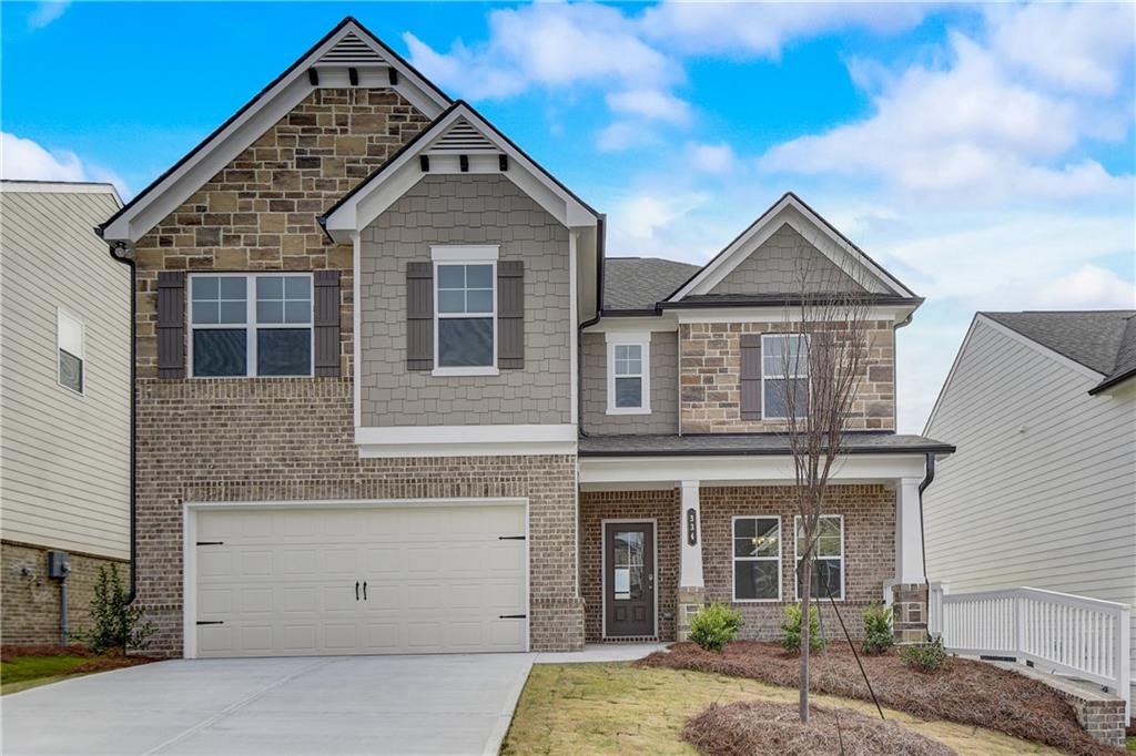 255 Wingate Drive Winder, GA 30680 - Photo 1 of 76 a front view of a house with a yard