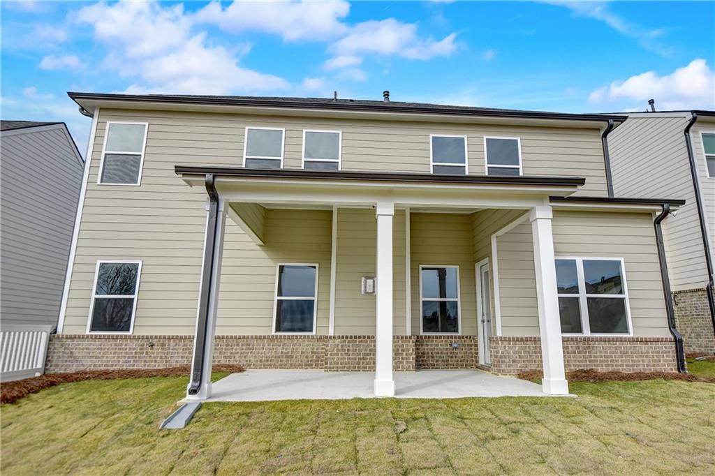 255 Wingate Drive Winder, GA 30680 - Photo 35 of 76 a front view of a house with a yard