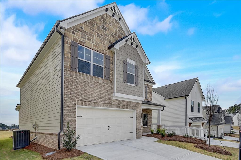 255 Wingate Drive Winder, GA 30680 - Photo 5 of 76 a front view of a house with garage