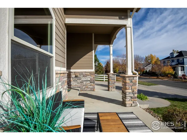 a view of backyard with sitting area