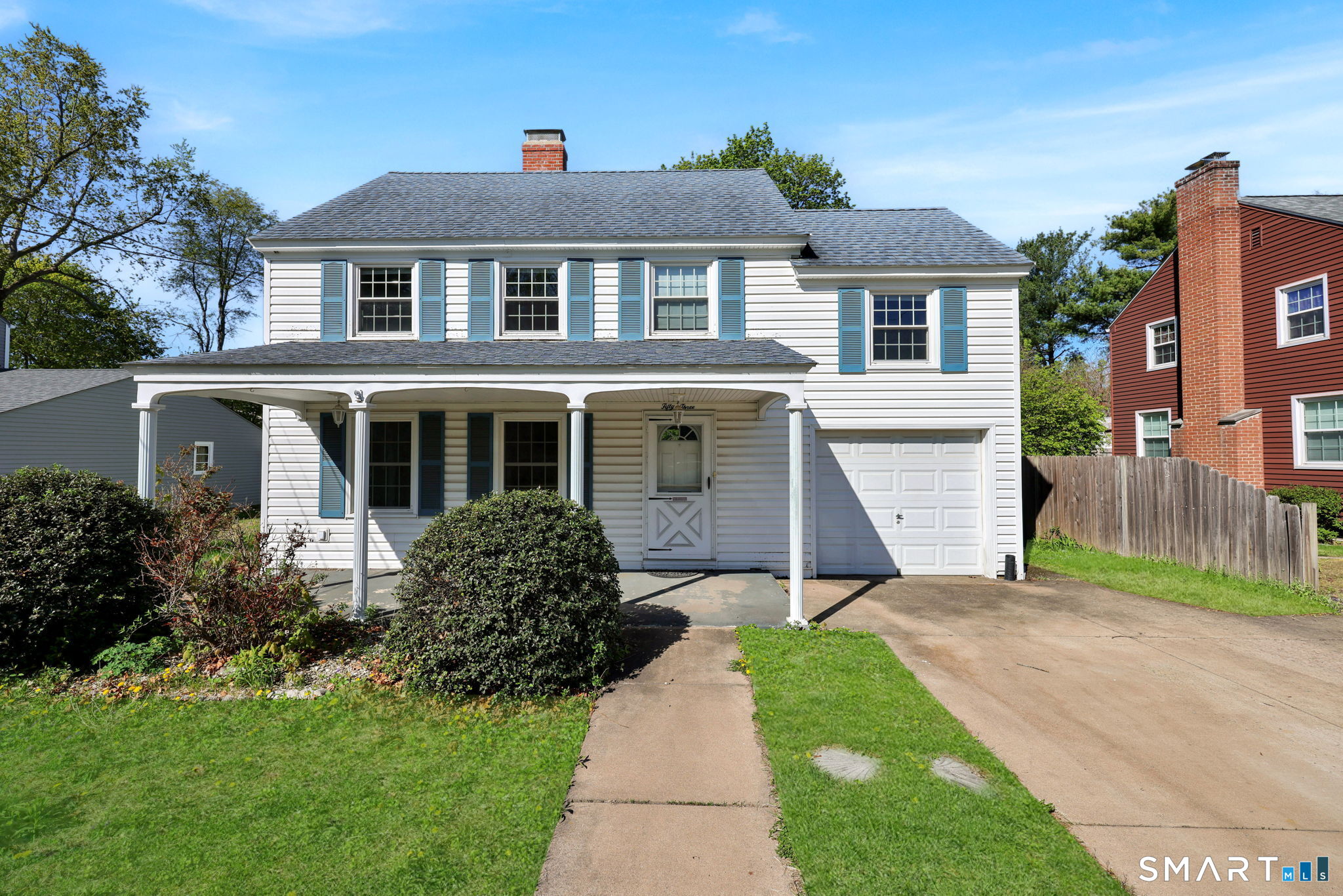 53 Alexander Street Manchester, CT 06040 - Photo 1 of 35 a front view of a house with garden