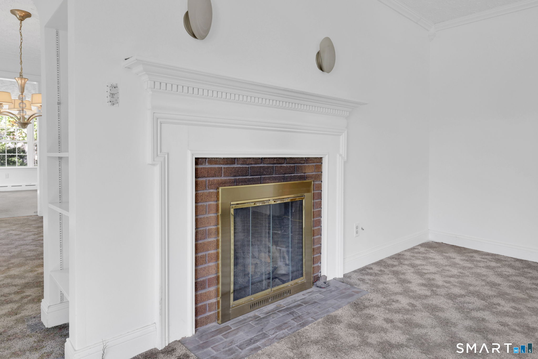 53 Alexander Street Manchester, CT 06040 - Photo 15 of 35 a view of a livingroom with a fireplace