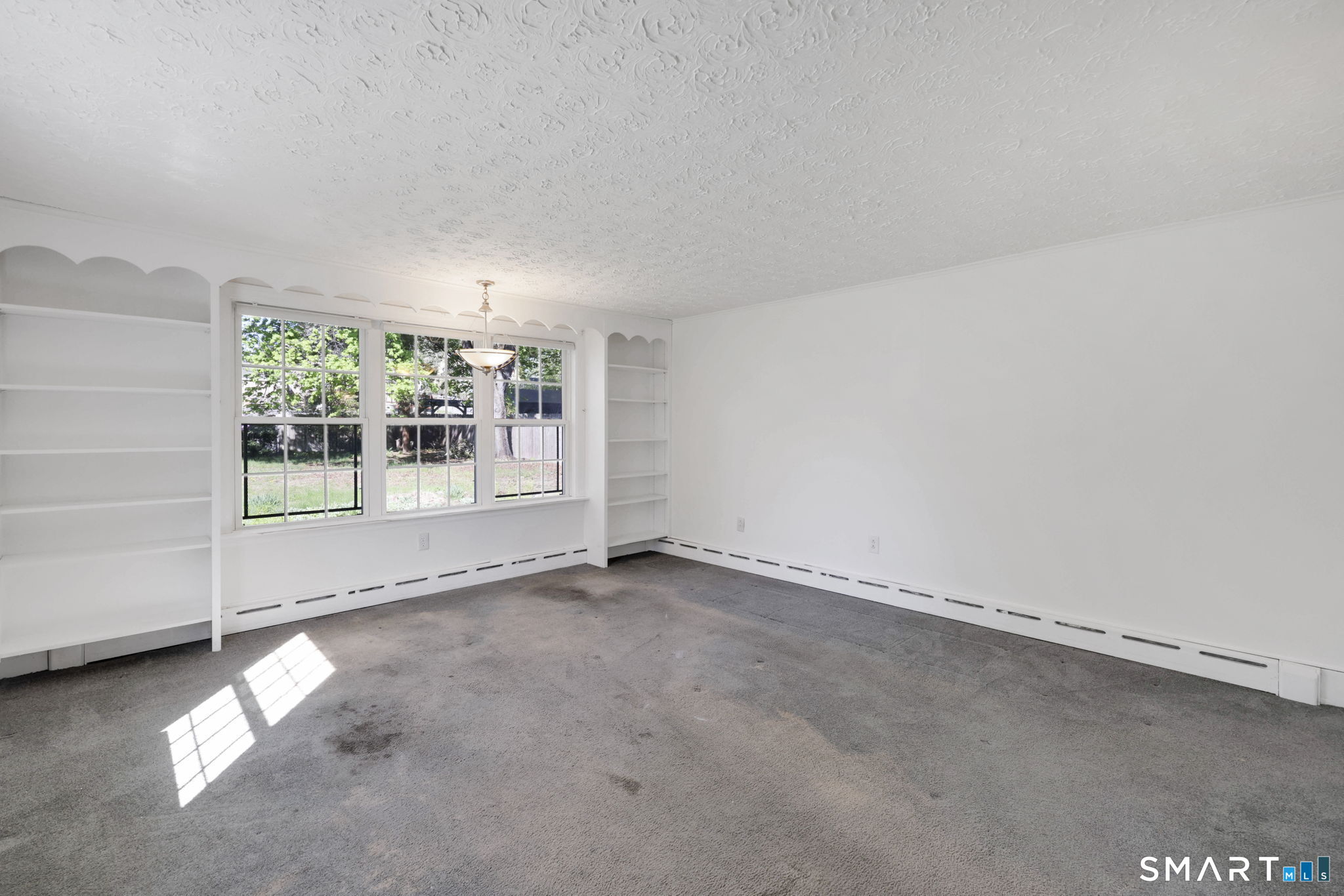 53 Alexander Street Manchester, CT 06040 - Photo 19 of 35 an empty room with windows