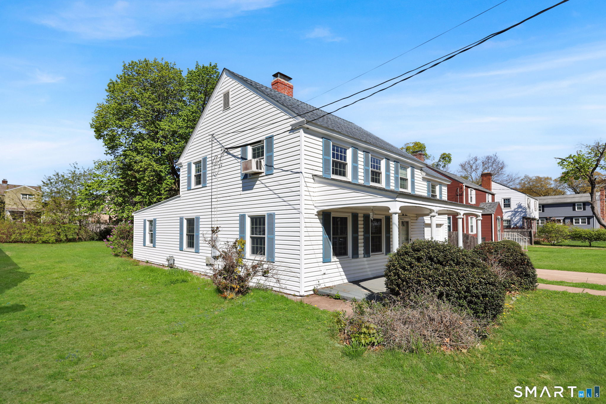 53 Alexander Street Manchester, CT 06040 - Photo 2 of 35 a view of a house with a yard