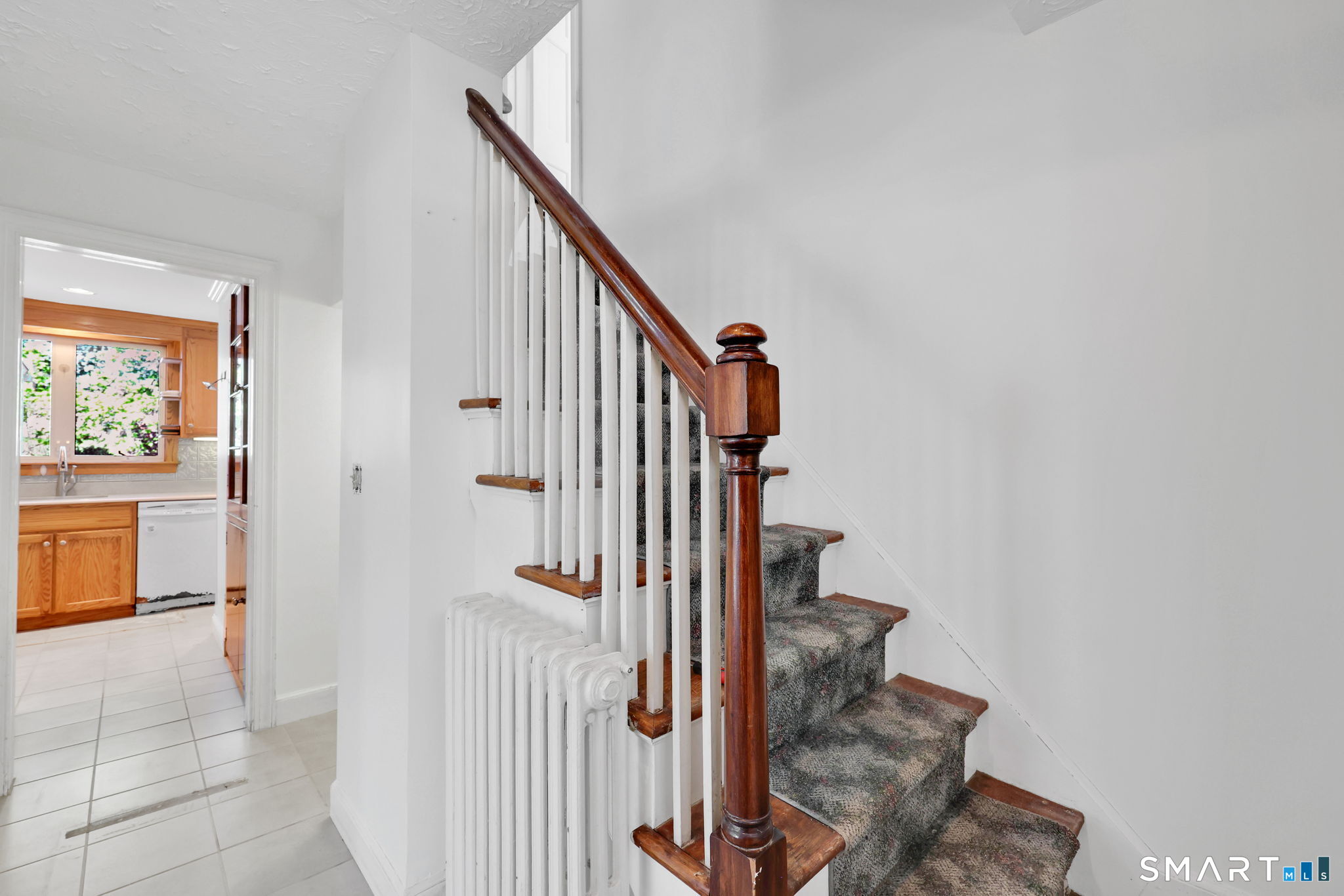 53 Alexander Street Manchester, CT 06040 - Photo 21 of 35 a view of entryway with wooden floor and stairs