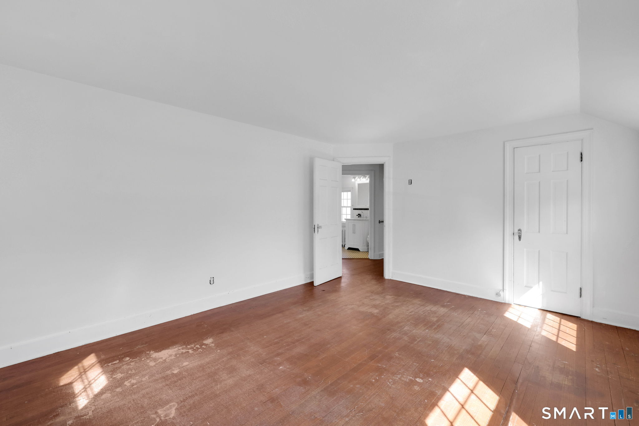 53 Alexander Street Manchester, CT 06040 - Photo 26 of 35 a view of an empty room and window
