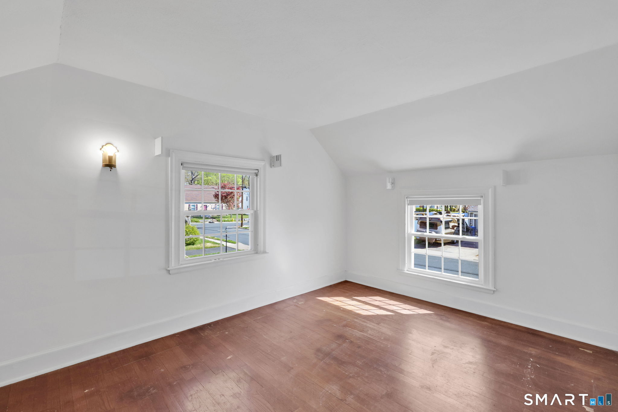 53 Alexander Street Manchester, CT 06040 - Photo 29 of 35 an empty room with windows