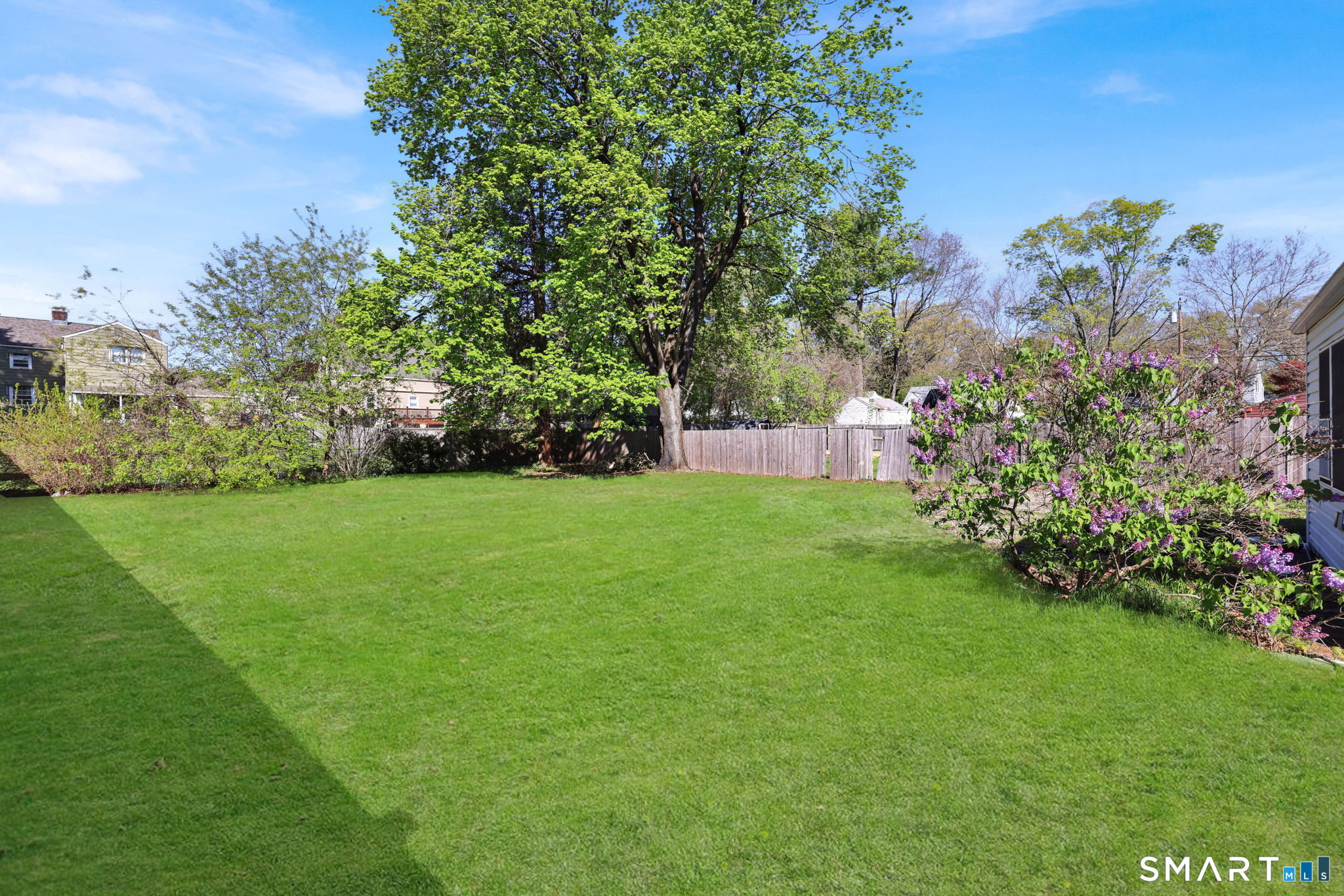 53 Alexander Street Manchester, CT 06040 - Photo 35 of 35 a view of green field with flowers in front of it
