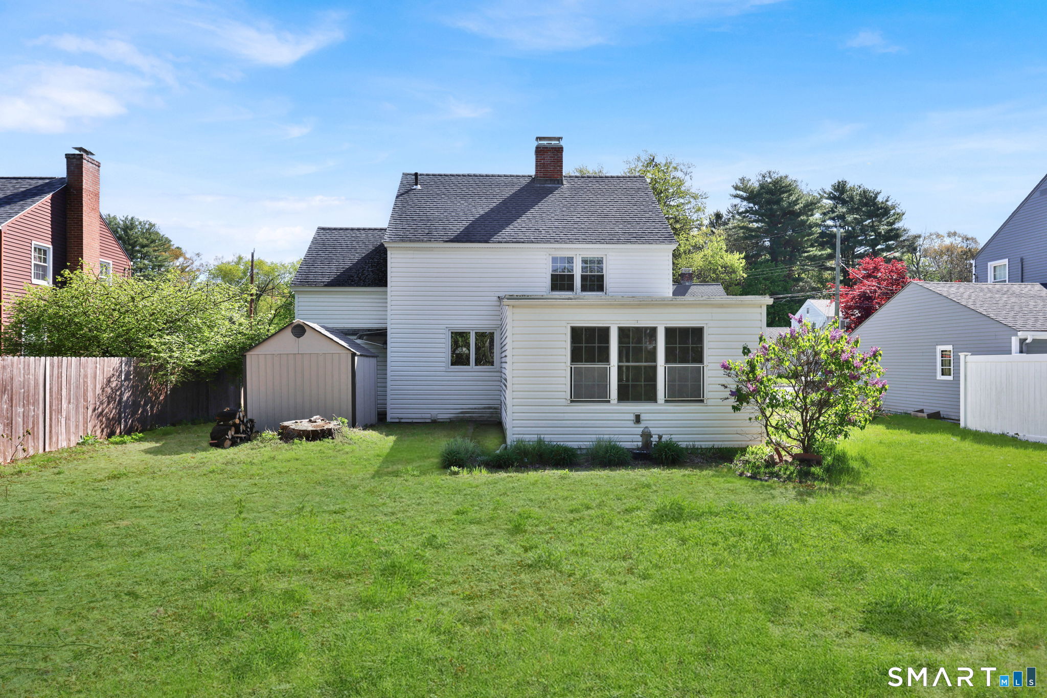 53 Alexander Street Manchester, CT 06040 - Photo 4 of 35 a front view of a house with a yard