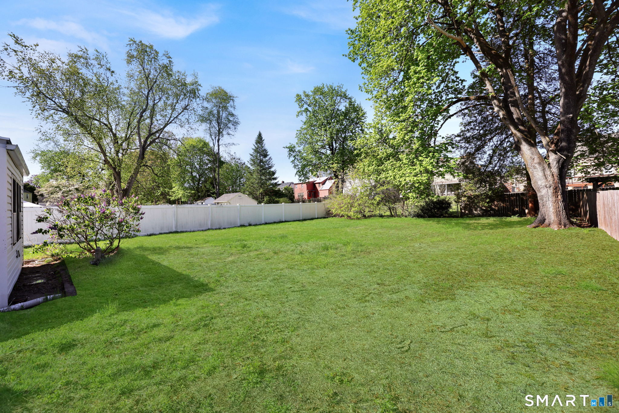 53 Alexander Street Manchester, CT 06040 - Photo 5 of 35 a view of green field with trees