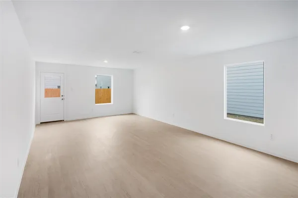 an empty room with windows