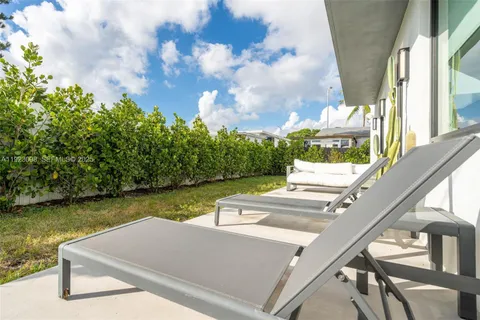a view of swimming pool from a balcony