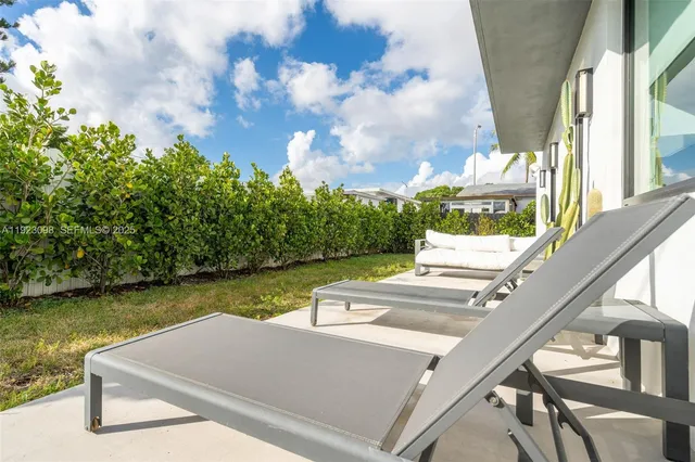 a view of swimming pool from a balcony