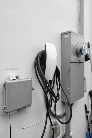 a bathroom with a sink mirror and toilet