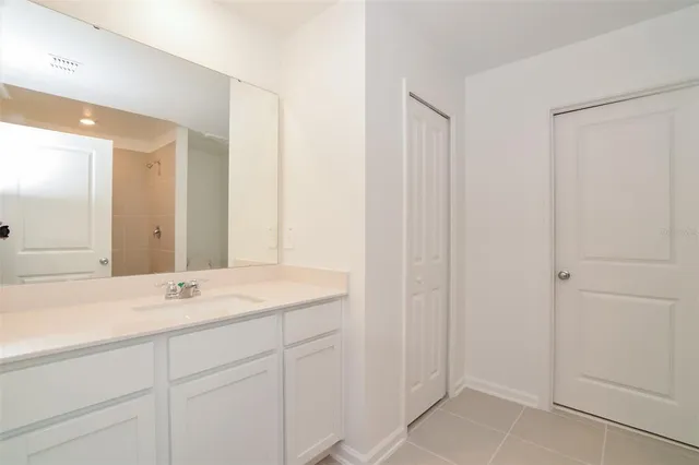 a sink with a mirror