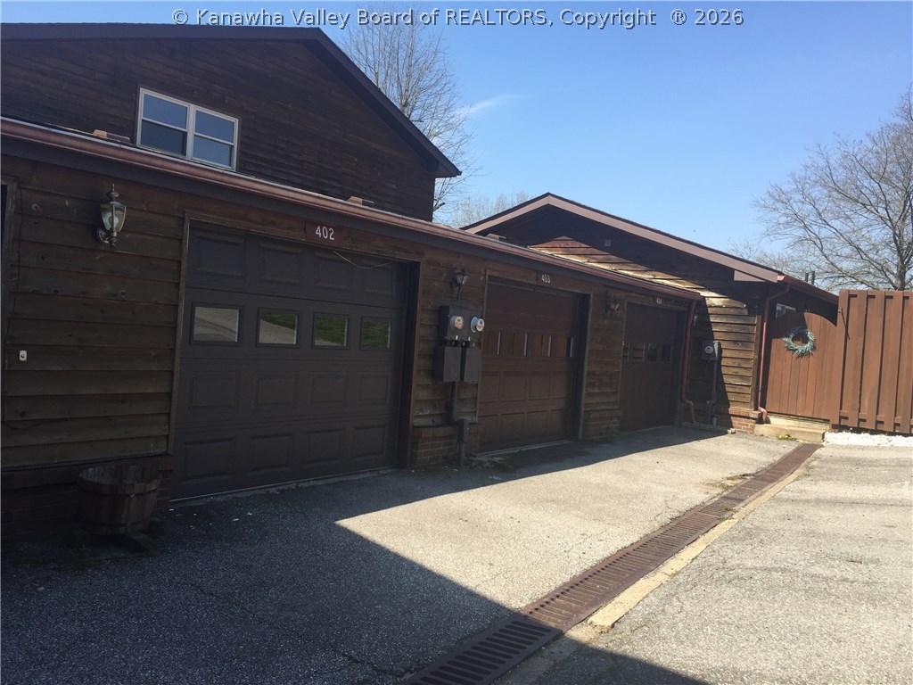 402 Powderhorn Road Charleston, WV 25314 - Photo 3 of 29 one car garage.