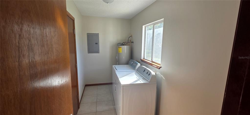 8246 Southwest 105th Place Ocala, FL 34481 - Photo 6 of 14 a view of an entryway with wooden floor