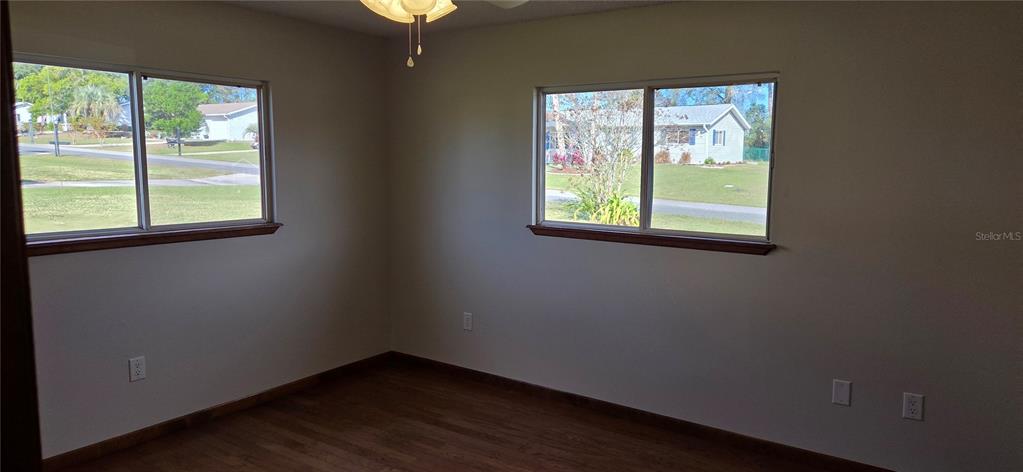 8246 Southwest 105th Place Ocala, FL 34481 - Photo 9 of 14 an empty room with a window