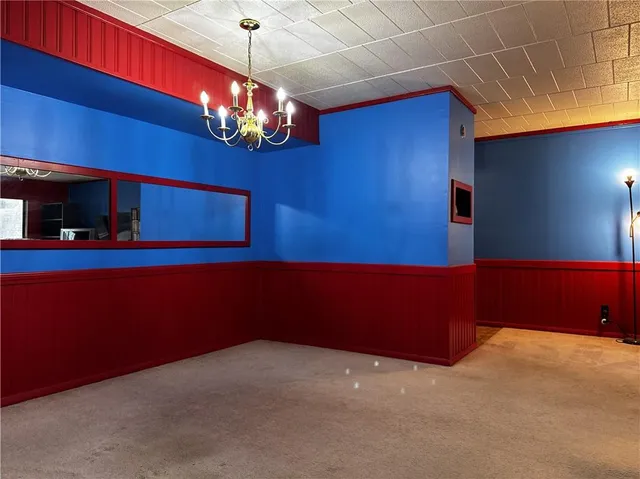 a room with table and chairs