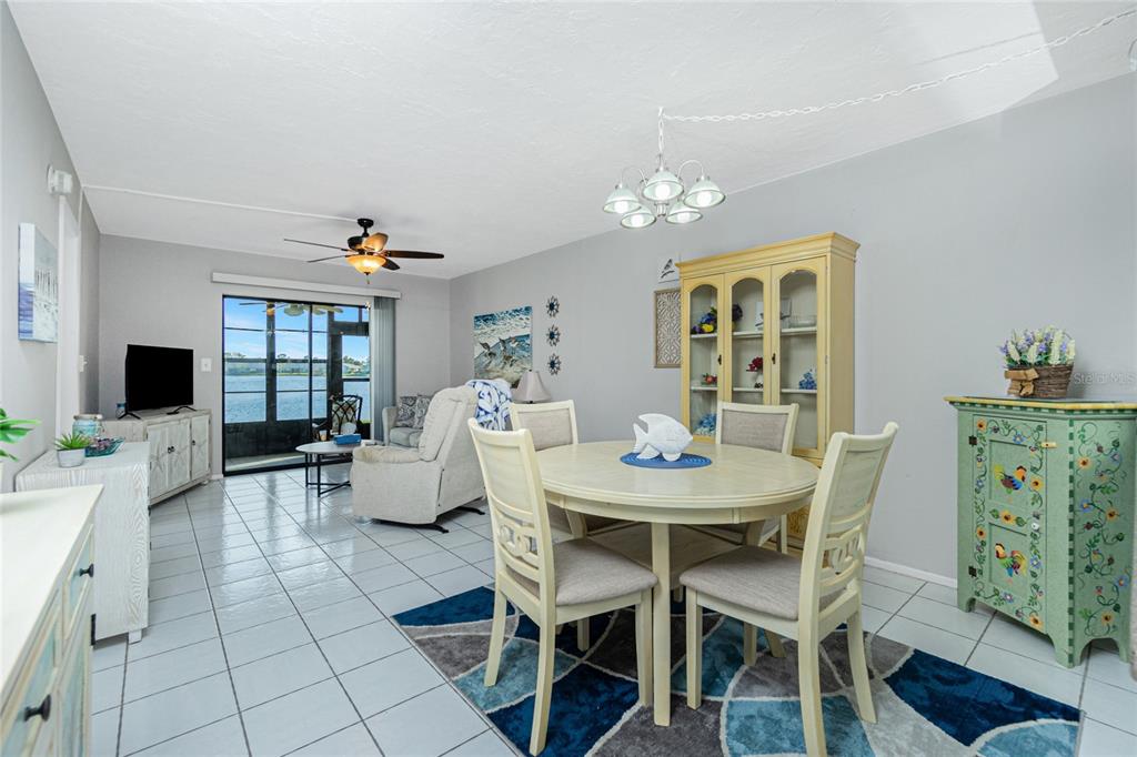 25225 Rampart Boulevard, Unit 1701 Punta Gorda, FL 33983 - Photo 7 of 21 a view of a dining room with furniture