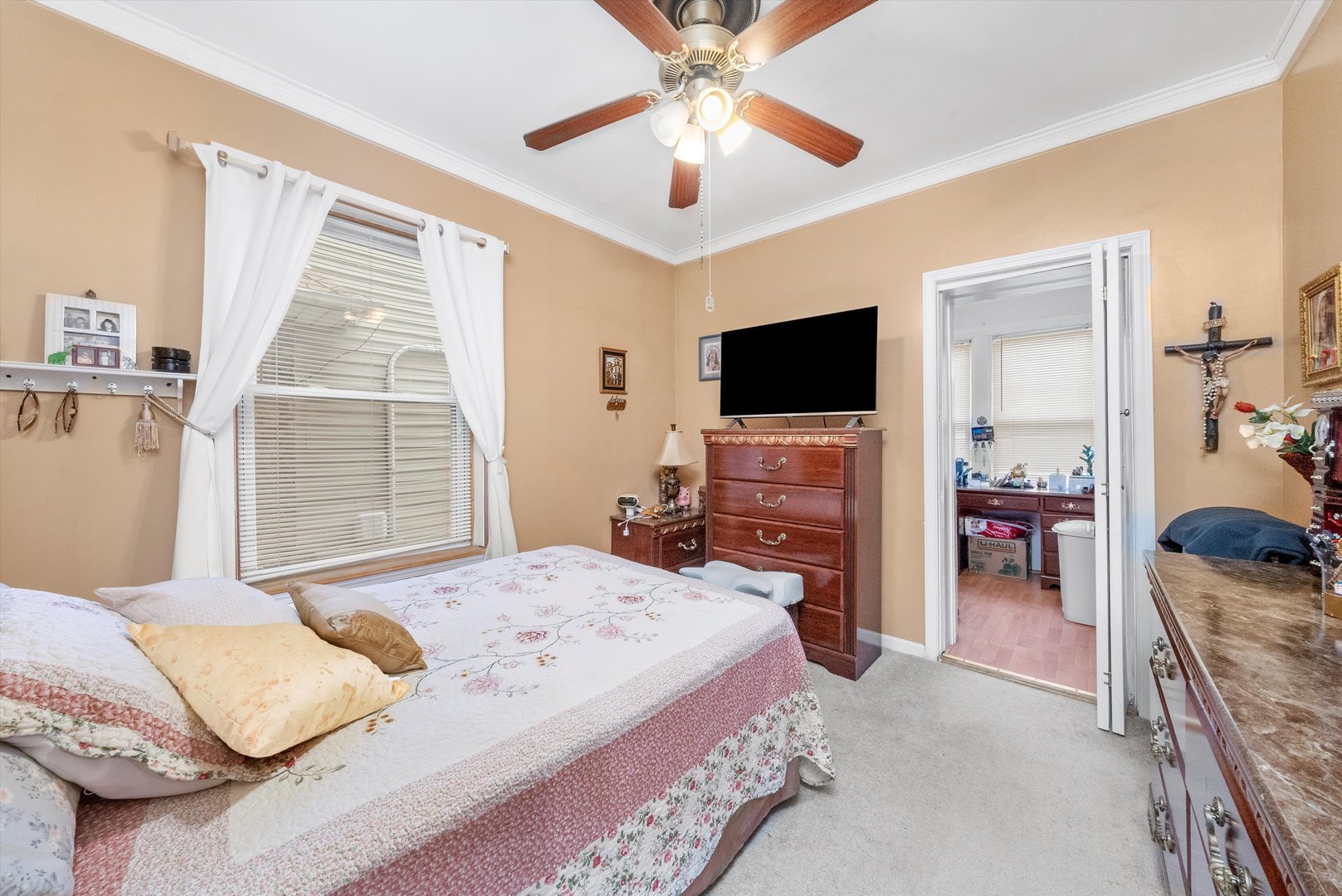 4100 West George Street Chicago, IL 60641 - Photo 18 of 49 a bedroom with a bed and a flat screen tv