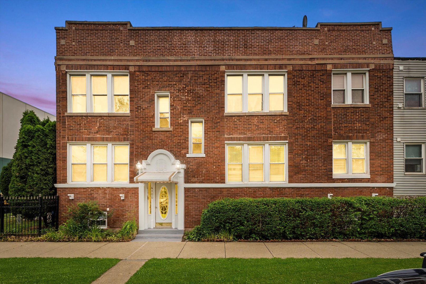 4100 West George Street Chicago, IL 60641 - Photo 2 of 49 a front view of a house