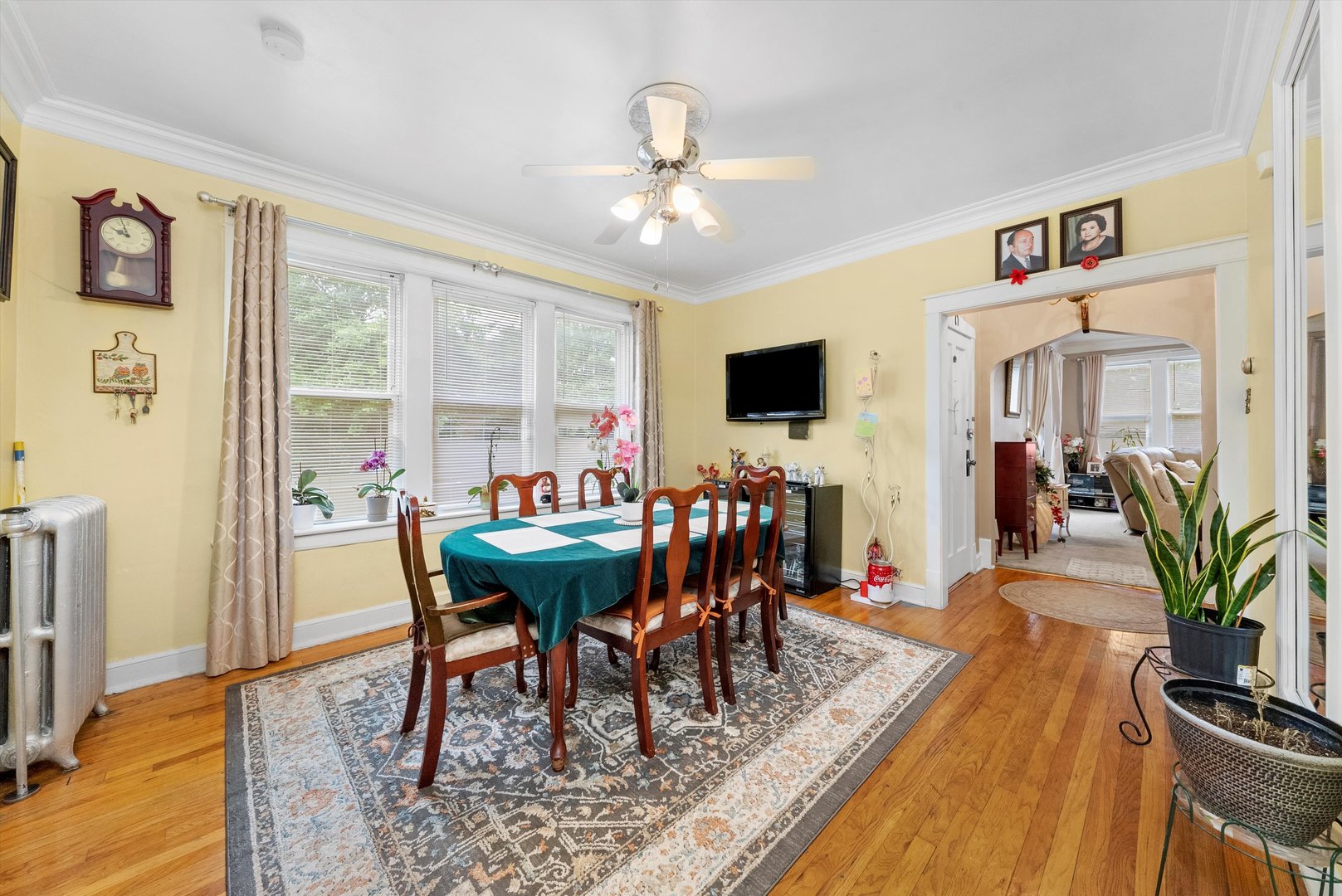 4100 West George Street Chicago, IL 60641 - Photo 30 of 49 a view of a dining room with furniture window and wooden floor