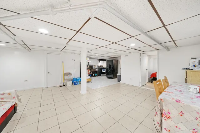 a bed room with a bed and furniture