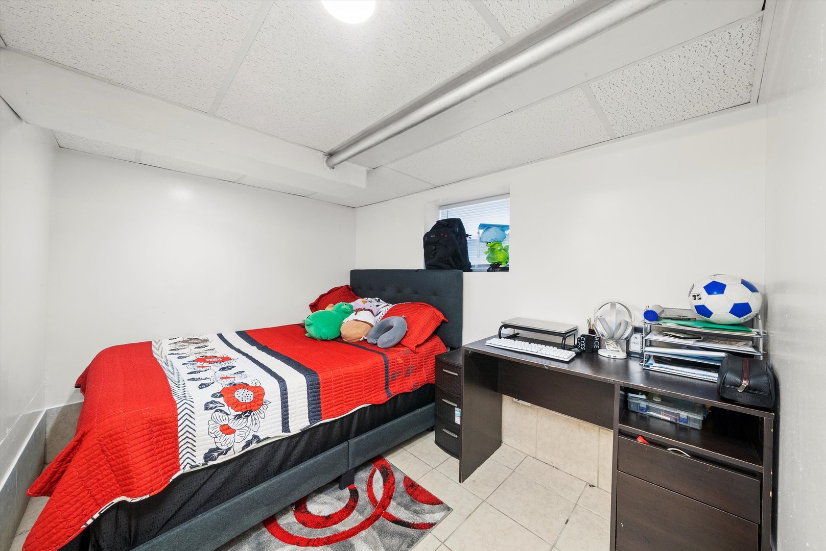 4100 West George Street Chicago, IL 60641 - Photo 38 of 49 a bedroom with bed and a table