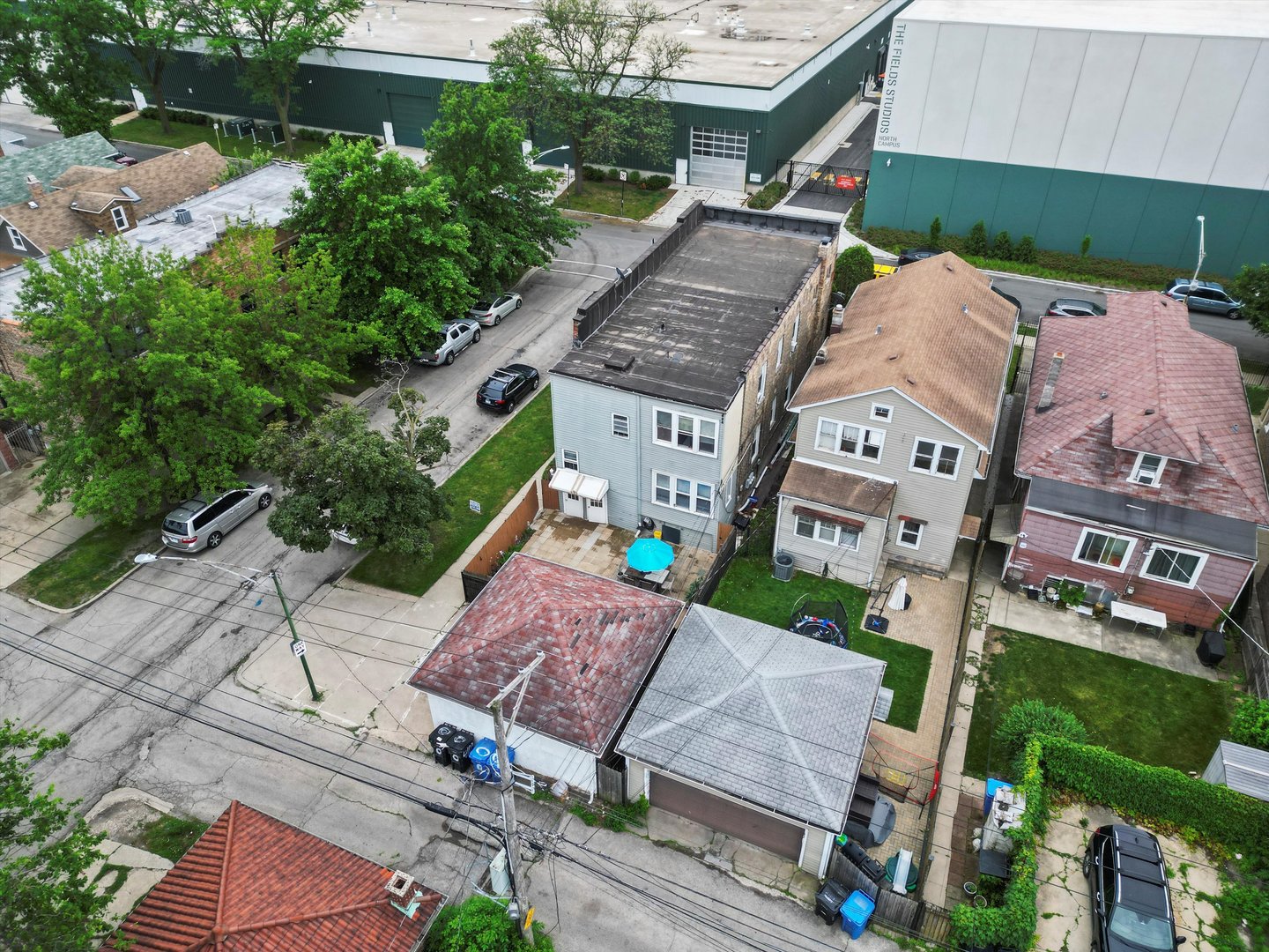 4100 West George Street Chicago, IL 60641 - Photo 6 of 49 an aerial view of a house with garden space and street view