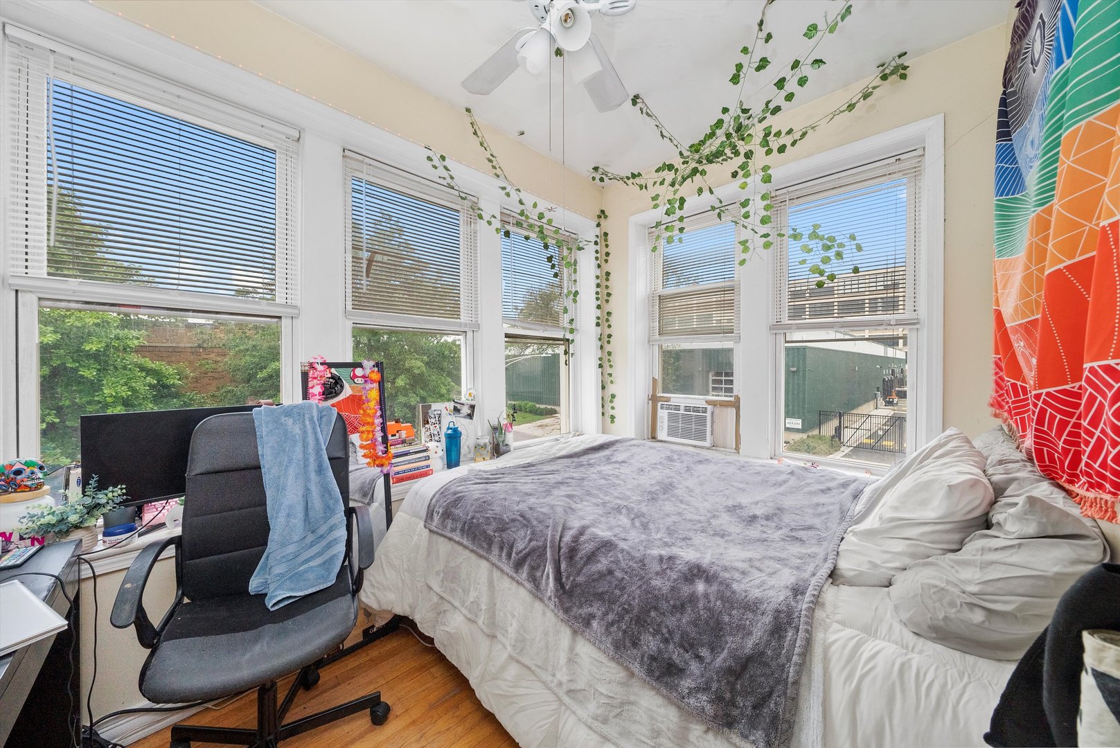 4100 West George Street Chicago, IL 60641 - Photo 8 of 49 a bed room with a bed and a window