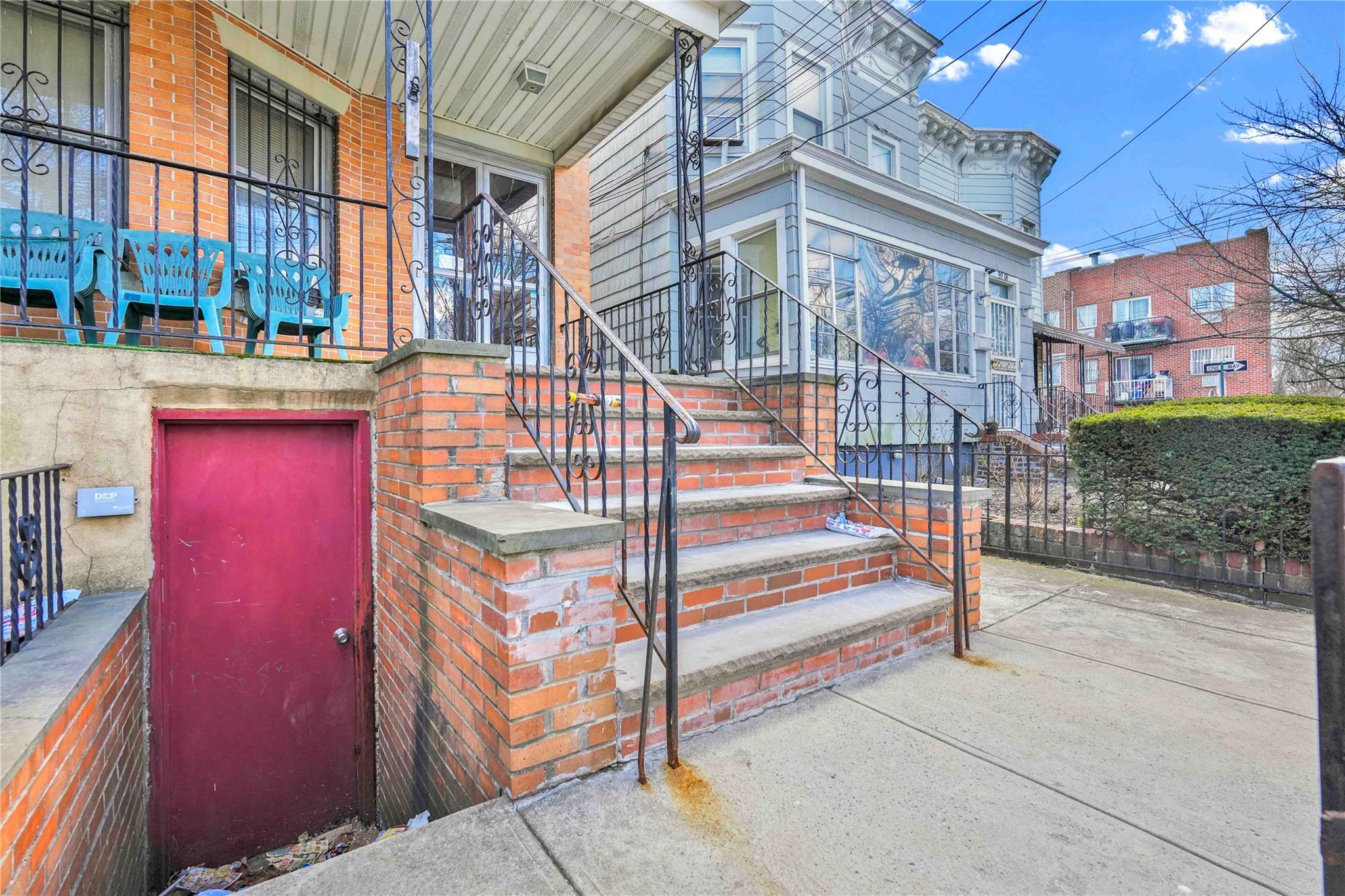 9908 35th Avenue Queens, NY 11368 - Photo 18 of 22 a view of a building with many windows