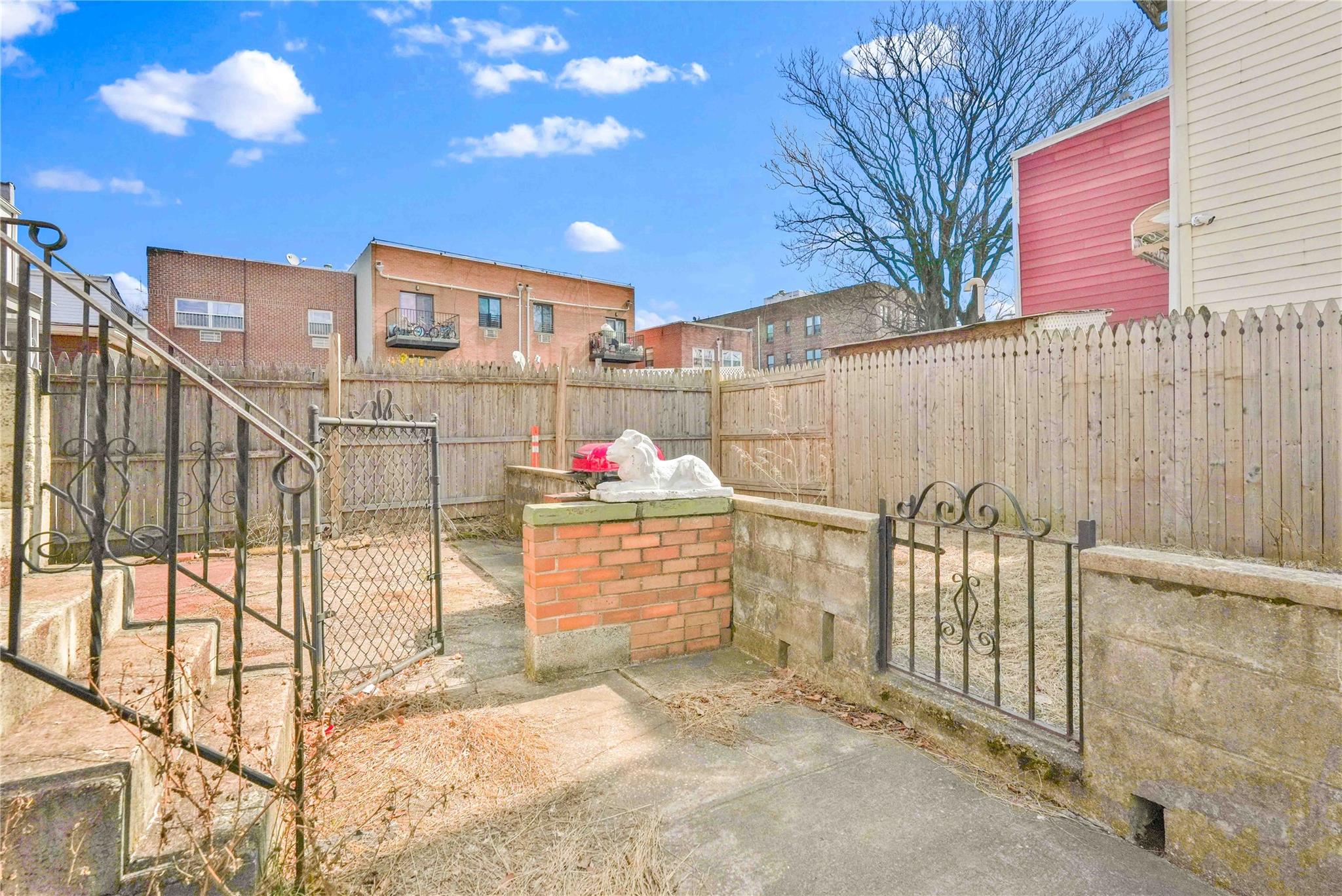 9908 35th Avenue Queens, NY 11368 - Photo 20 of 22 a view of a wrought iron fences