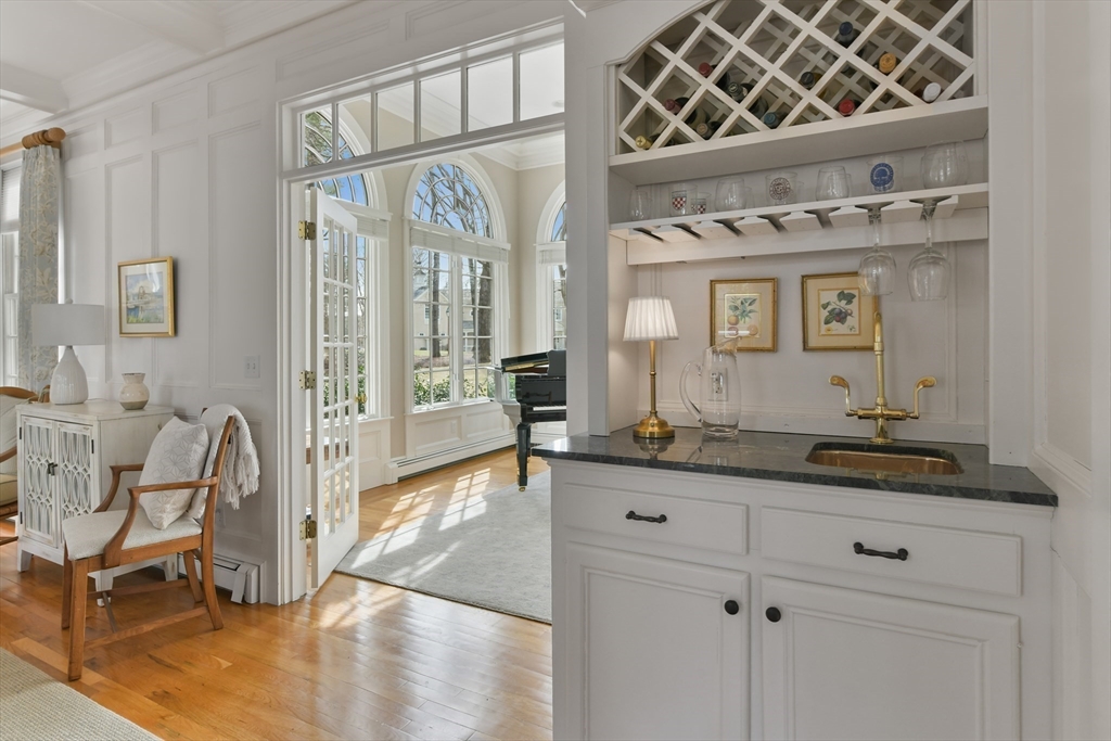 11 Olmsted Drive Hingham, MA 02043 - Photo 16 of 36 a spacious bathroom with a granite countertop sink and a mirror