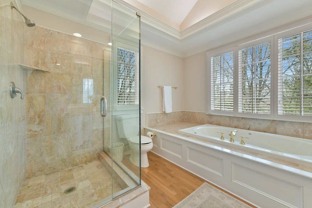11 Olmsted Drive Hingham, MA 02043 - Photo 22 of 36 a spacious bathroom with a tub a sink and a shower