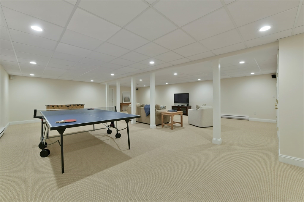 11 Olmsted Drive Hingham, MA 02043 - Photo 32 of 36 a view of a room with gym equipment and a large window