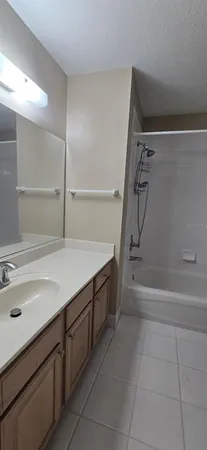a bathroom with a sink and a tub