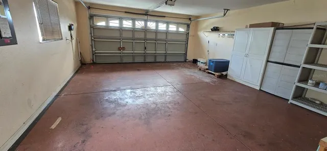 a view of empty room with empty shelves