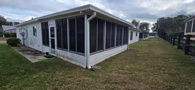 a view of a backyard with pathway