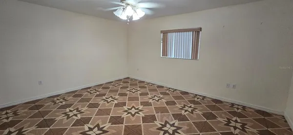 a view of a bedroom with a window