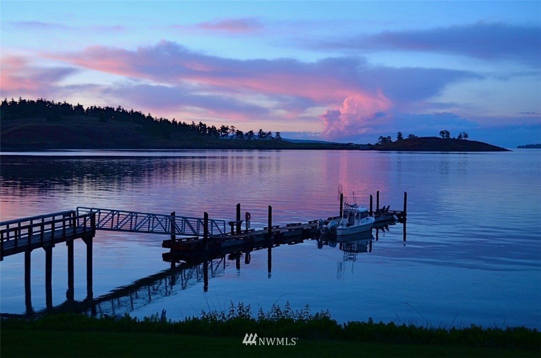 416 Lonesome Cove Road Friday Harbor, WA 98250 - Photo 12 of 40 a view of a lake with sitting area