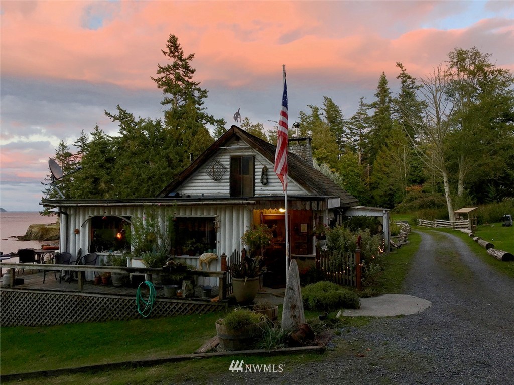 416 Lonesome Cove Road Friday Harbor, WA 98250 - Photo 14 of 40 a front view of a house with garden