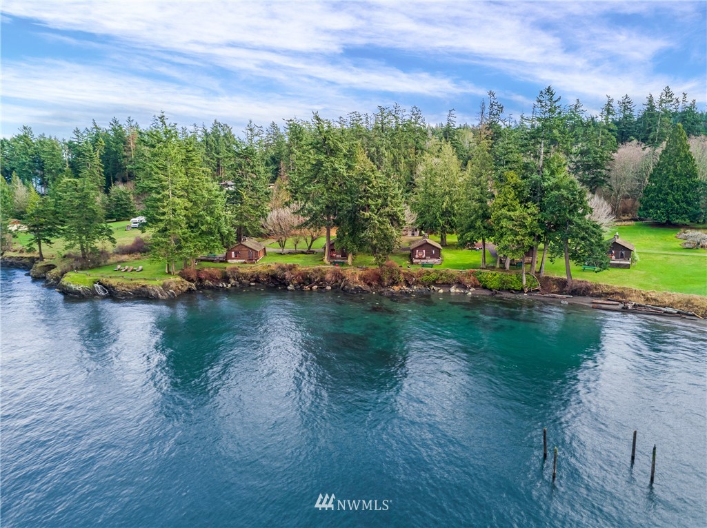 416 Lonesome Cove Road Friday Harbor, WA 98250 - Photo 21 of 40 a view of a lake with houses in the back