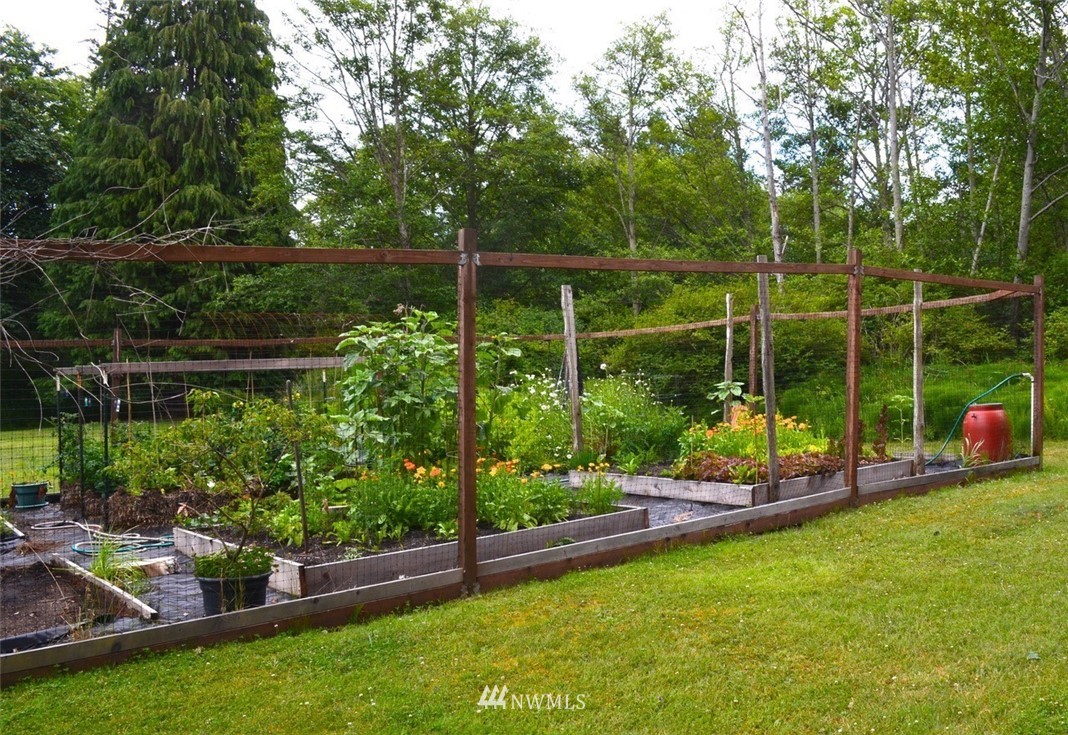 416 Lonesome Cove Road Friday Harbor, WA 98250 - Photo 28 of 40 a view of a park with swings and slides