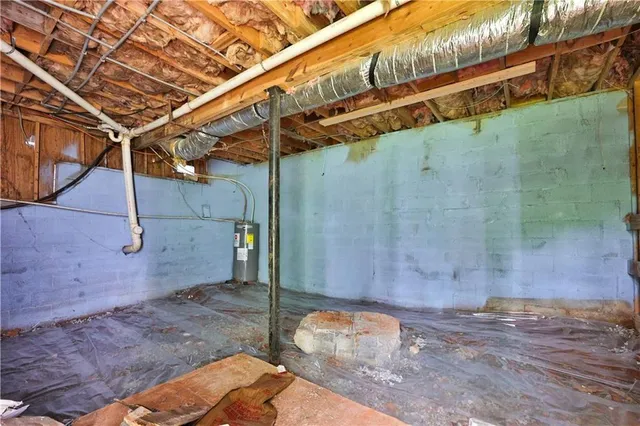 a view of a room with wooden walls