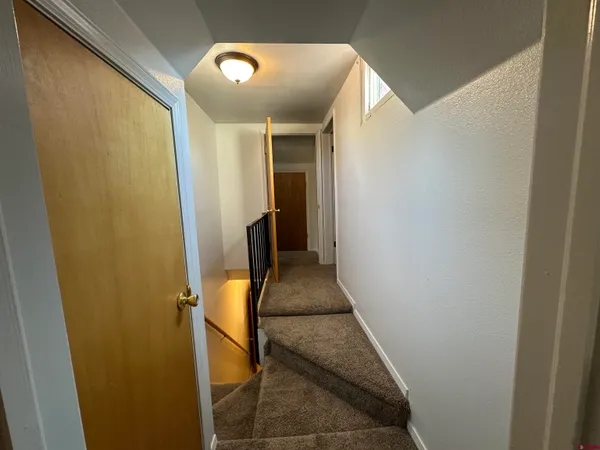 a hallway with sliding door